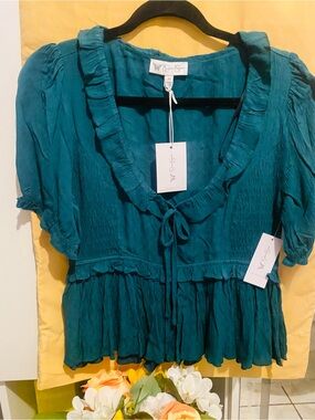 Beautiful Ruffled Trim Teal V-Neck Peplum Blouse.
